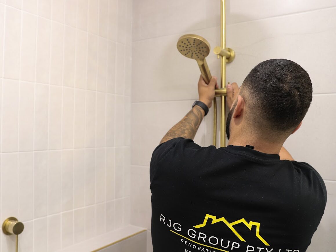 Robert Ghalbouni CEO of RJG Group working on bathroom renovations